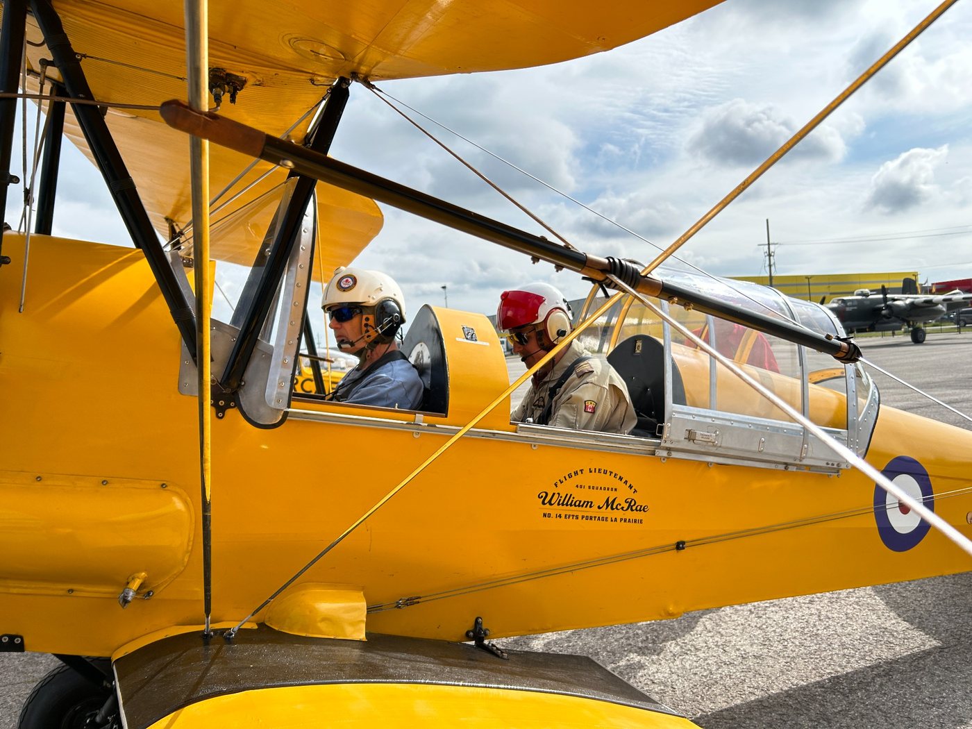 Randy seated in a de Havilland Tiger Moth before flight